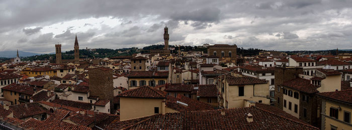 Buildings in city against sky