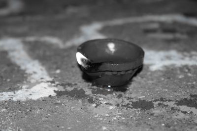 Close-up of metallic ball on table