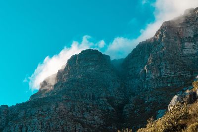 Scenic view of rocky mountains against sky