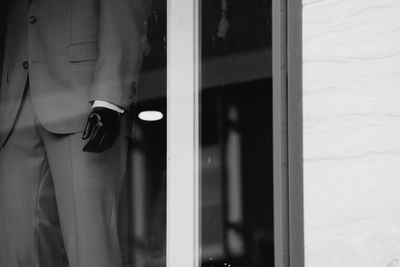 Reflection of display dummy behind glass window