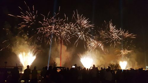 Firework display at night