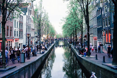 People walking in canal