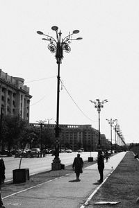 Street against clear sky in city