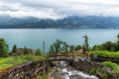 Saint beatus cave entrance and nearby waterfall. taken in interlaken, switzerland