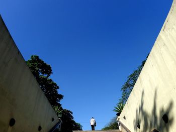 Low angle view of built structure against blue sky