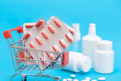 High angle view of pills in container
