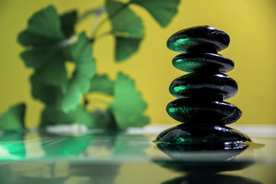 Close-up of stone stack on table