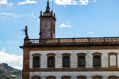 Low angle view of old building against sky