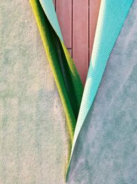 High angle view of multi colored paper on table