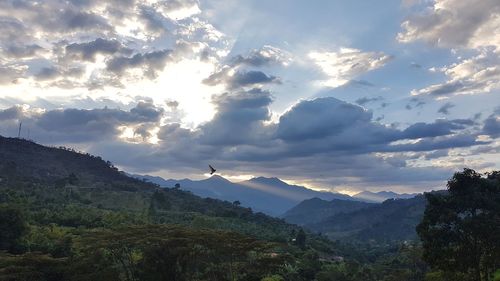 Scenic view of mountains against sky during sunset