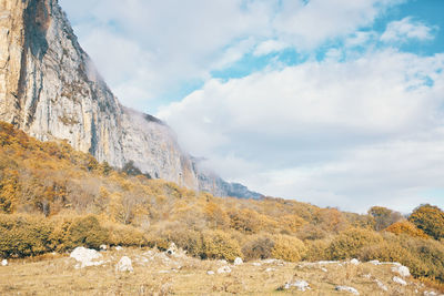 Scenic view of rocky mountains against sky