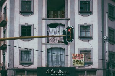 Low angle view of sign on building