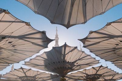 Low angle view of roof and building against sky