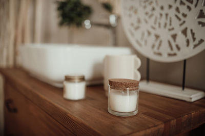 Luxury interior of big bathroom at modern african style with oval bathtub in natural lighting