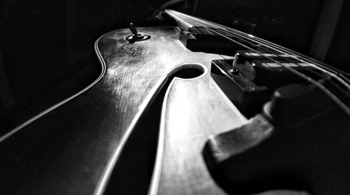 Close-up of guitar in darkroom