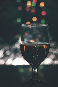 Close-up of wineglass on table