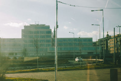 Buildings in city against sky