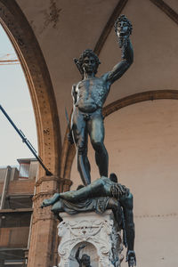 Low angle view of statue of historic building