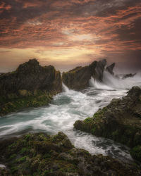 Scenic view of sea against sky during sunset