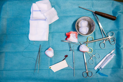 High angle view of surgical equipment on table