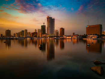 Manila city with reflection and pastel color sky