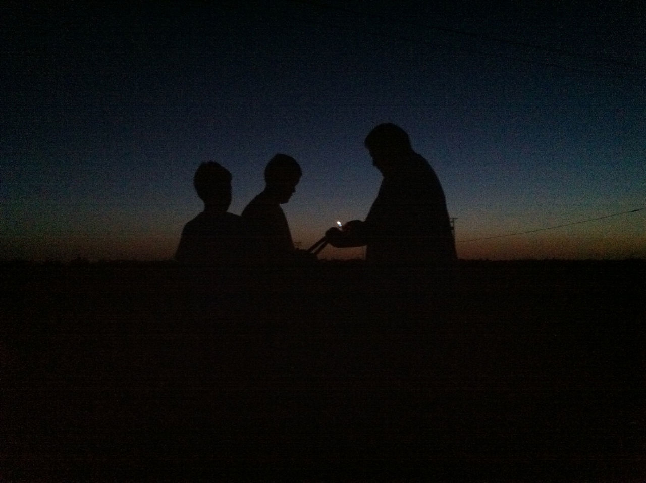 silhouette, togetherness, men, bonding, lifestyles, leisure activity, love, sunset, friendship, copy space, person, outline, dark, family, sitting, standing, sky
