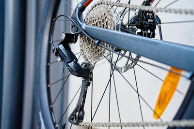 Shifting gears on rear transmission of bicycle. bicycle gear drivetrain and cassette, close up