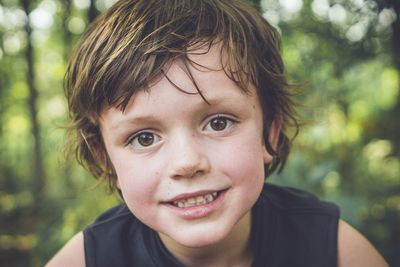 Close-up portrait of smiling boy