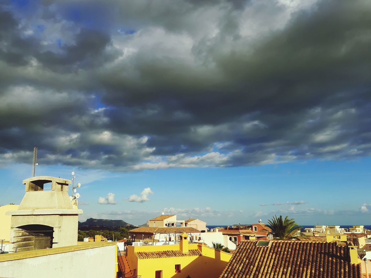 TOWNSCAPE AGAINST SKY