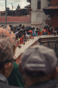 Rear view of people at town square