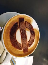 Close-up of cappuccino on table