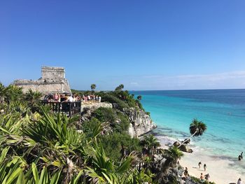 Scenic view of sea against clear blue sky
