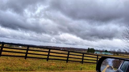 Scenic view of dramatic sky over landscape