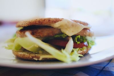 Close-up of burger in plate on table