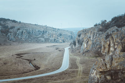 Scenic view of mountain road against sky