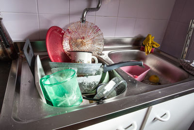 High angle view of drinking water in container at home