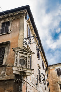 Low angle view of old building against sky