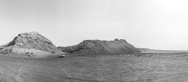 Scenic view of land against clear sky