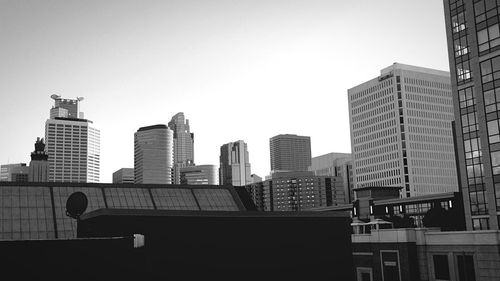 Low angle view of skyscrapers against sky