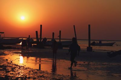 Scenic view of sea at sunset
