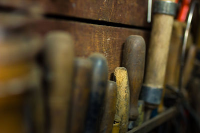 Wooden tools hanging on wall