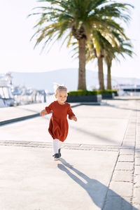 Full length rear view of boy