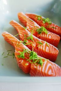 Close-up of uncooked seafood in container