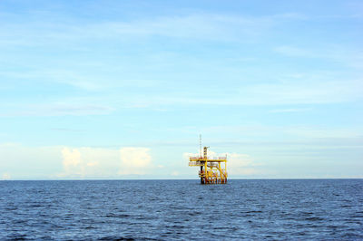 Ship in sea against sky