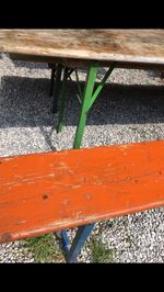 High angle view of bench in park