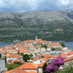 High angle view of town against mountain