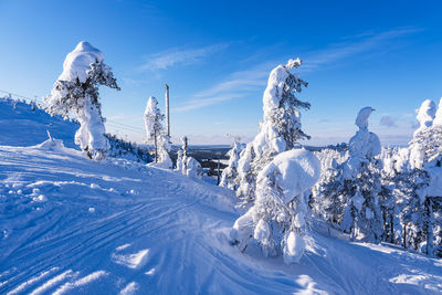 Snow covered mountain against sky during winter