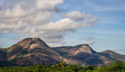 View of mountain range against cloudy sky