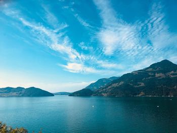 Scenic view of lake against blue sky