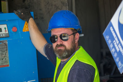 Side view of man working at construction site